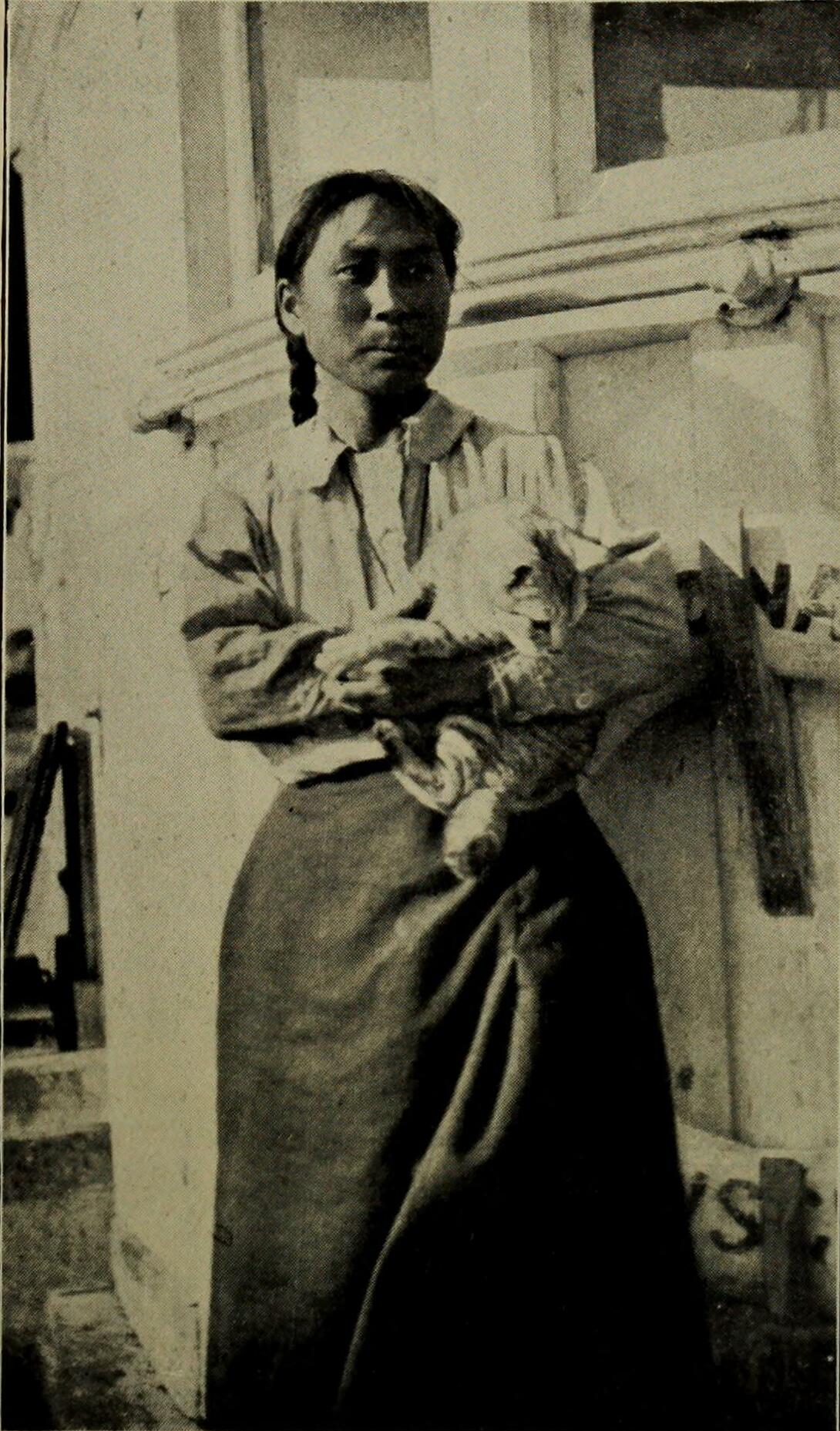 Ada Blackjack with her cat Vic aboard the rescue ship Donaldson, photographed upon her rescue in August 1923