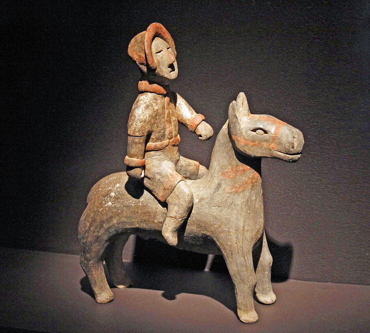 Terracotta cavalry and warhorse from the Qin era, reflecting the army that Shang Yang's merit system forged. Terracotta cavalry and warhorse from the Qin era, reflecting the army that Shang Yang's merit system forged.